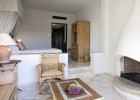 cyprus-hotels-annabelle-hotel-garden-studio-sitting-with-fireplace